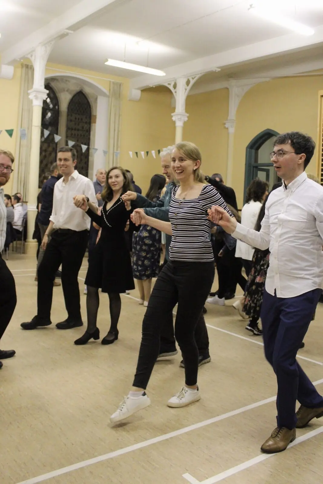 Young people dancing in line