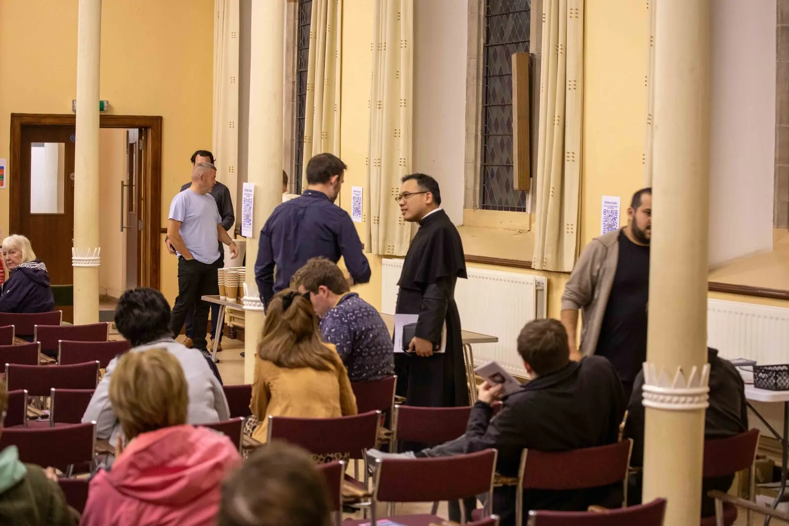 Priest among participants